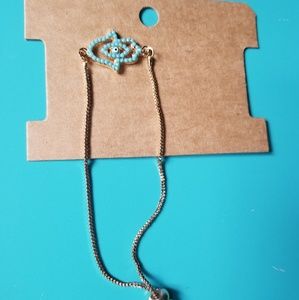 Turquoise hamsa on gold adjustable bracelet